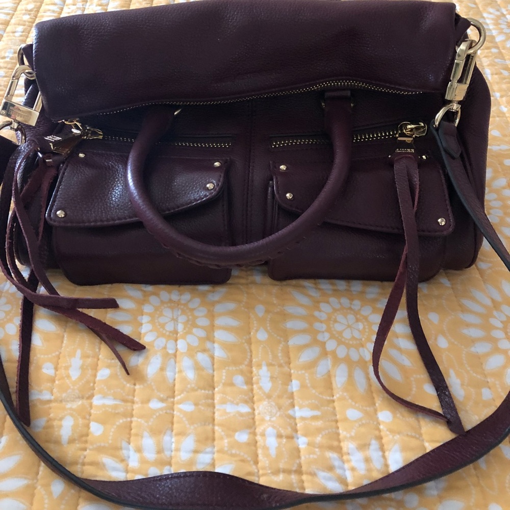 Genuine leather zipped satchel type bag w/ strap